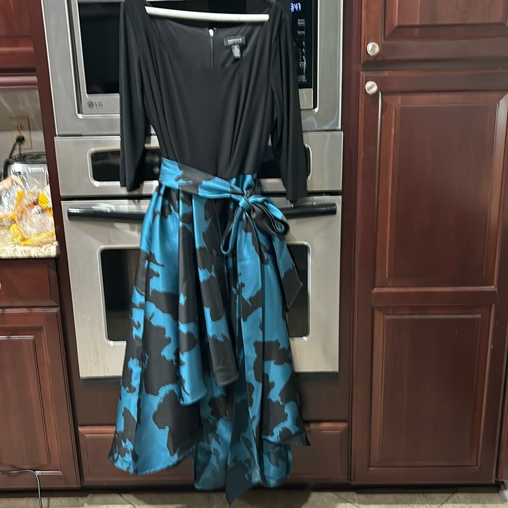 Women’s holiday high low dress, shorter in the front.
